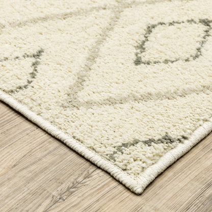 7' X 9' Gray And Ivory Geometric Shag Area Rug