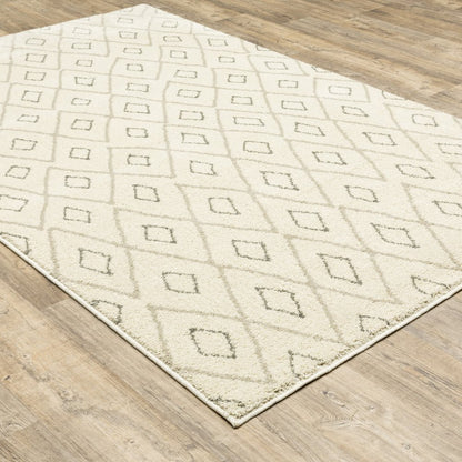 7' X 9' Gray And Ivory Geometric Shag Area Rug