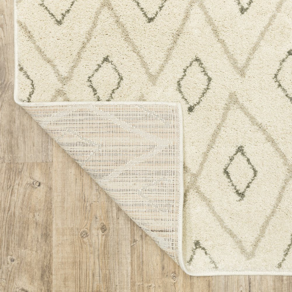 7' X 9' Gray And Ivory Geometric Shag Area Rug