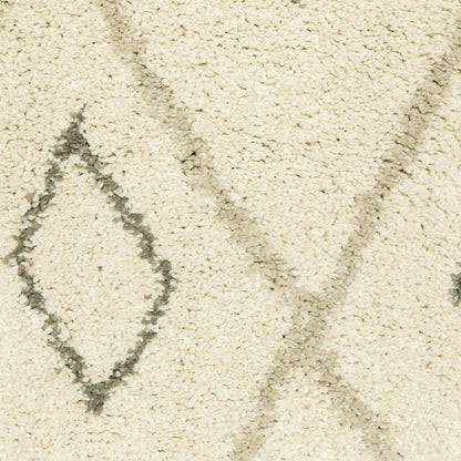 7' X 9' Gray And Ivory Geometric Shag Area Rug