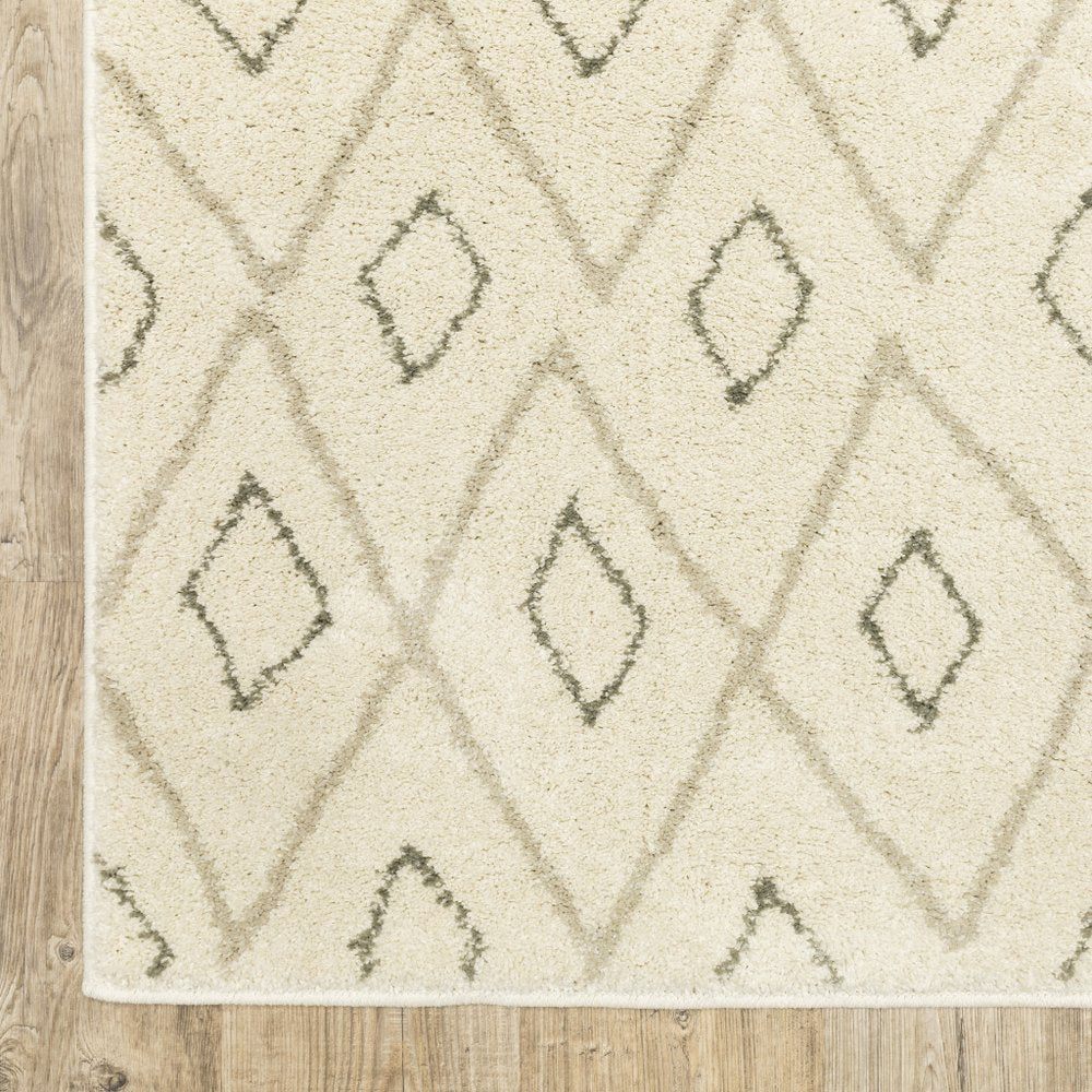 7' X 9' Gray And Ivory Geometric Shag Area Rug