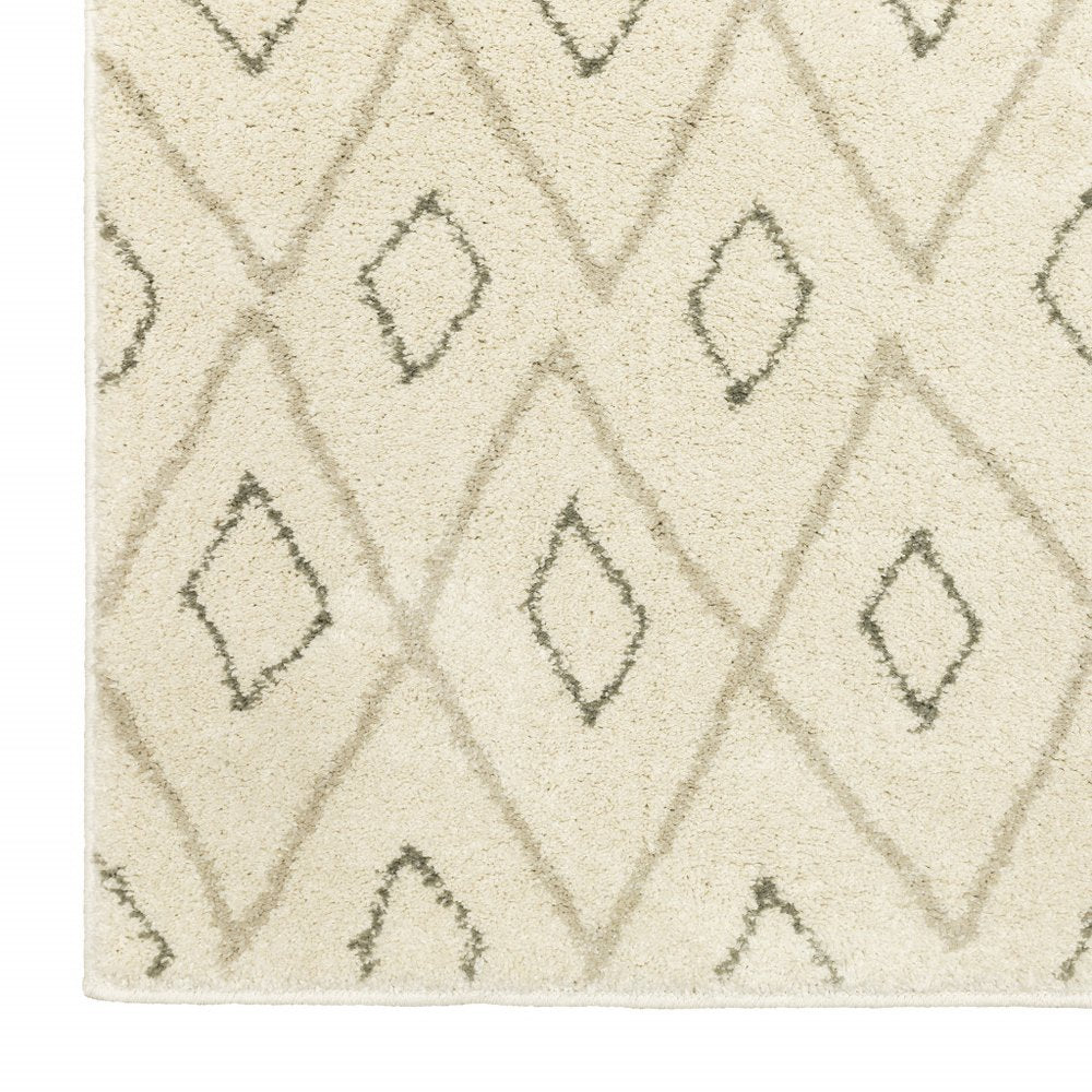 7' X 9' Gray And Ivory Geometric Shag Area Rug