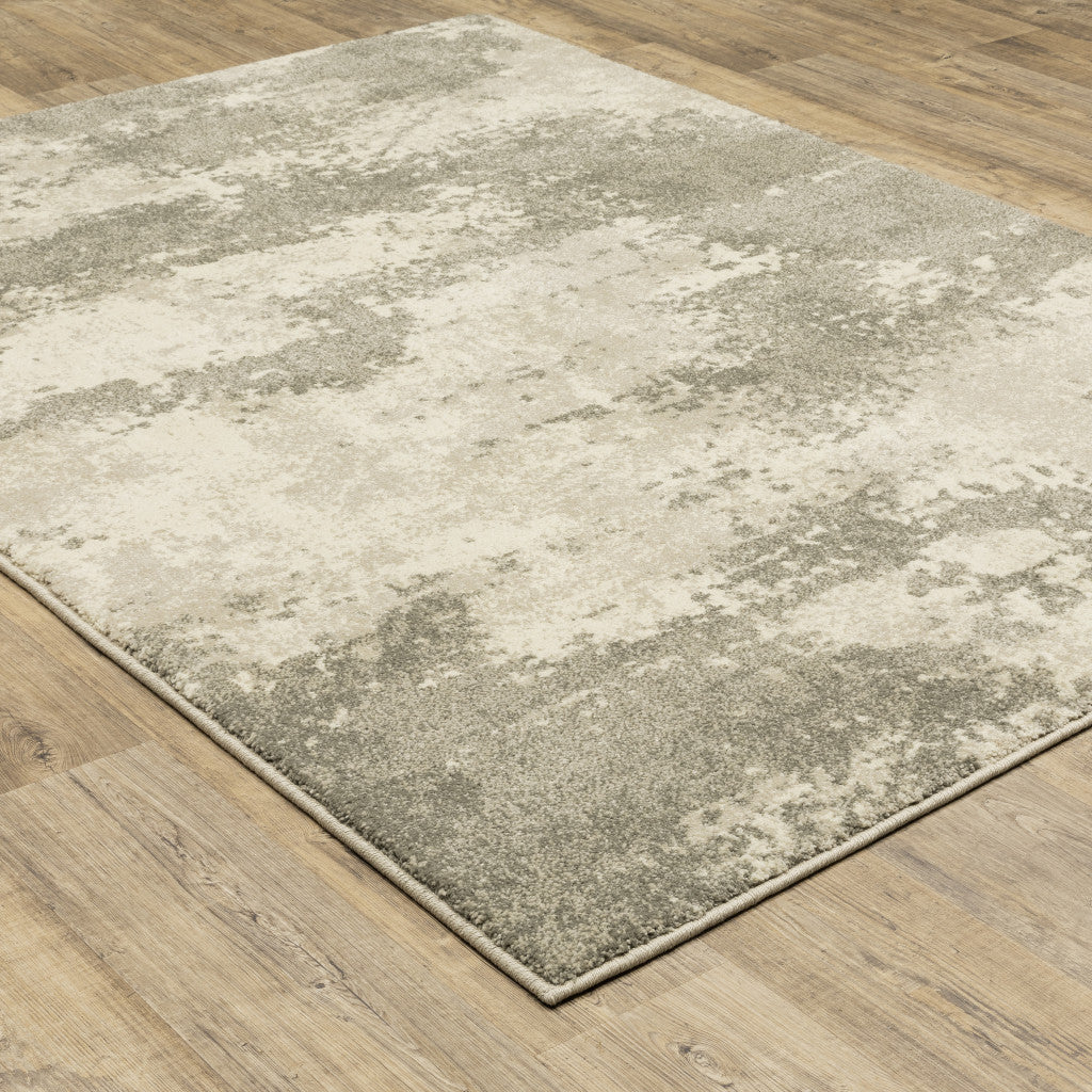 2' X 3' Beige And Grey Abstract Power Loom Stain Resistant Area Rug