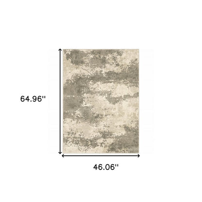 4' X 6' Beige And Grey Abstract Power Loom Stain Resistant Area Rug