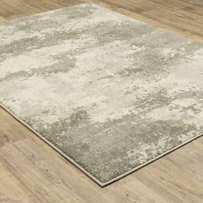 7' X 9' Beige And Ivory Abstract Shag Area Rug