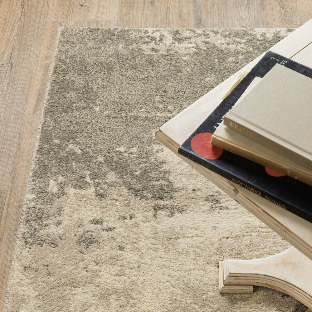 7' X 9' Beige And Ivory Abstract Shag Area Rug