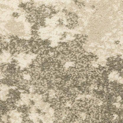 7' X 9' Beige And Ivory Abstract Shag Area Rug