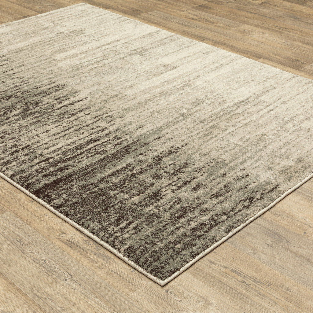 5' X 7' Beige And Grey Abstract Power Loom Stain Resistant Area Rug