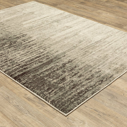 7' X 9' Beige And Ivory Abstract Shag Area Rug