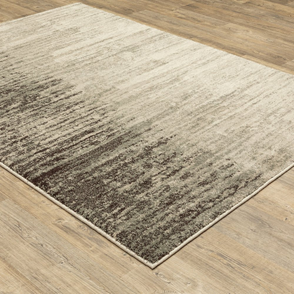 7' X 9' Beige And Ivory Abstract Shag Area Rug