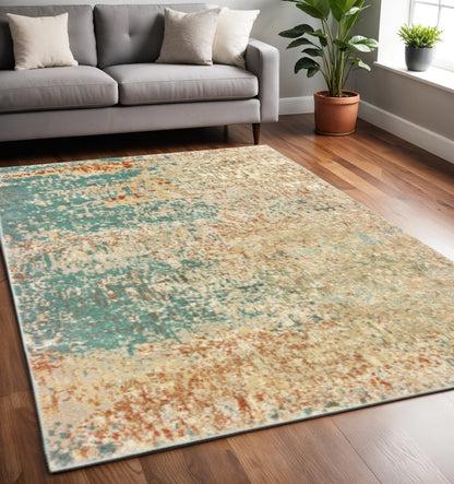 5' X 7' Foam Blue Pumpkin And Golden Yellow Abstract Power Loom Stain Resistant Area Rug