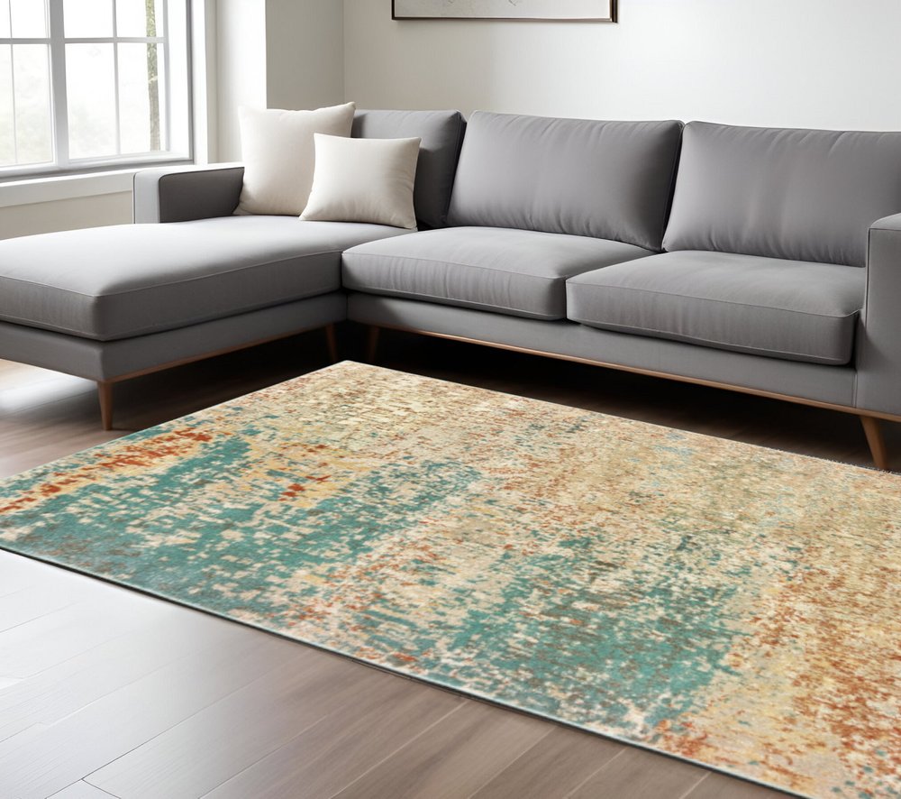 10' X 13' Foam Blue Pumpkin And Golden Yellow Abstract Power Loom Stain Resistant Area Rug