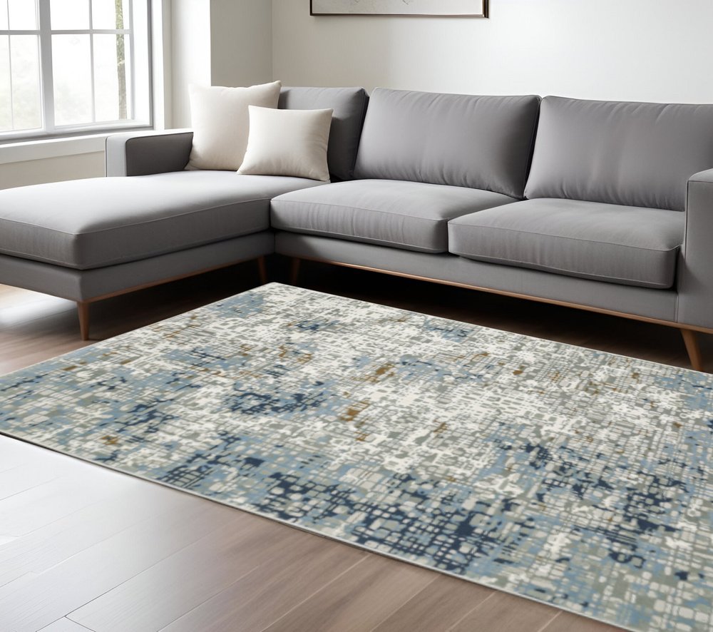 10' X 13' Blue Ivory Grey Brown Beige And Light Blue Abstract Power Loom Stain Resistant Area Rug