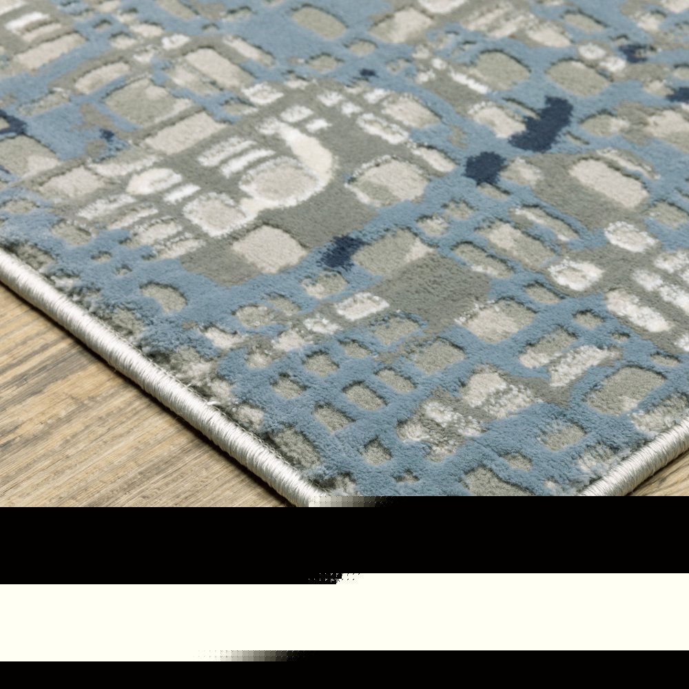 10' X 13' Blue Ivory Grey Brown Beige And Light Blue Abstract Power Loom Stain Resistant Area Rug