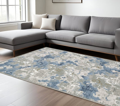 6' X 9' Grey Blue Ivory Navy Beige And Brown Abstract Power Loom Stain Resistant Area Rug