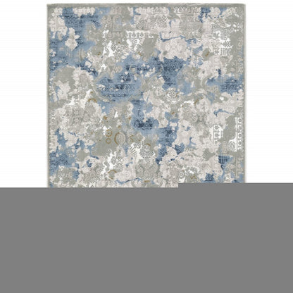 6' X 9' Grey Blue Ivory Navy Beige And Brown Abstract Power Loom Stain Resistant Area Rug