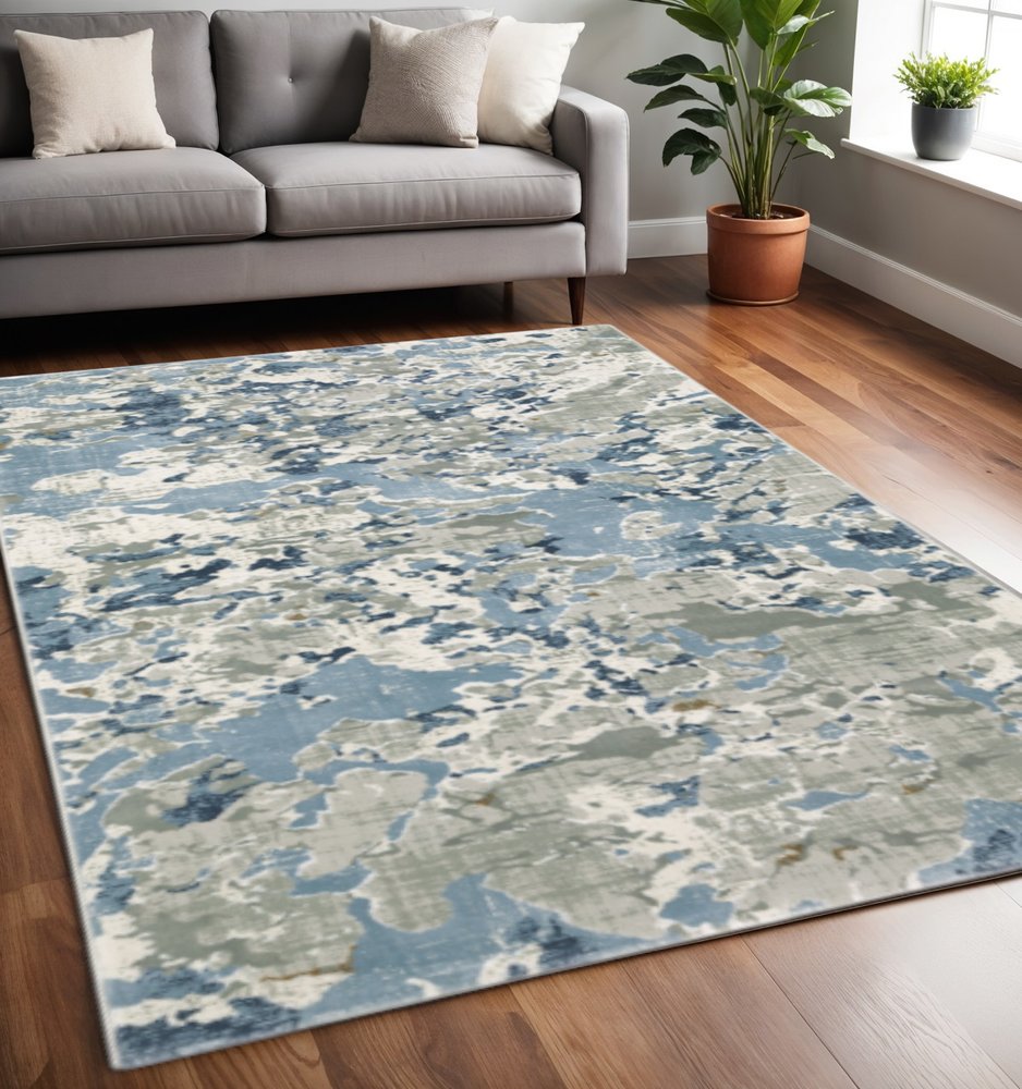 5' X 8' Grey Blue Ivory Navy Beige And Brown Abstract Power Loom Stain Resistant Area Rug
