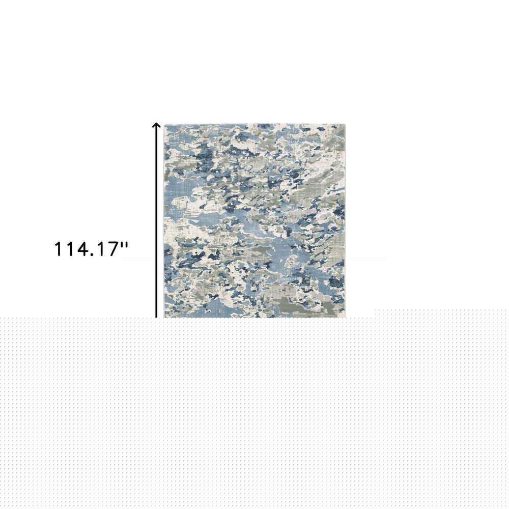 6' X 9' Grey Blue Ivory Navy Beige And Brown Abstract Power Loom Stain Resistant Area Rug