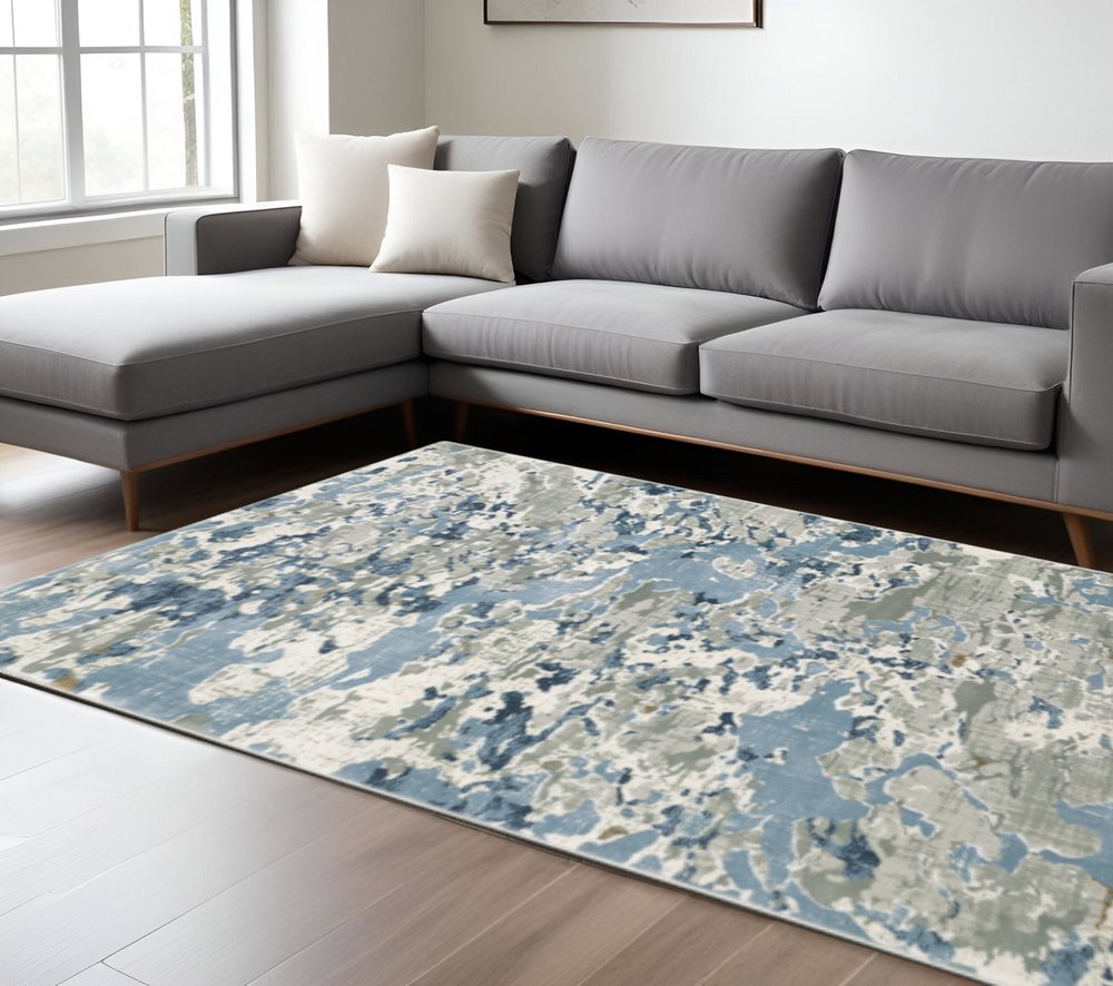 6' X 9' Grey Blue Ivory Navy Beige And Brown Abstract Power Loom Stain Resistant Area Rug
