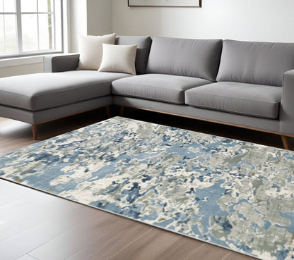6' X 9' Grey Blue Ivory Navy Beige And Brown Abstract Power Loom Stain Resistant Area Rug