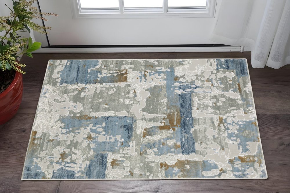 3' X 5' Grey Blue Navy Ivory And Brown Abstract Power Loom Stain Resistant Area Rug