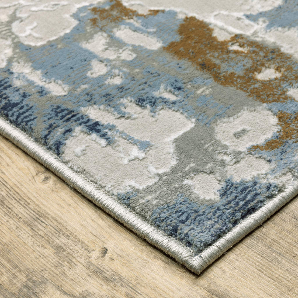 3' X 5' Grey Blue Navy Ivory And Brown Abstract Power Loom Stain Resistant Area Rug