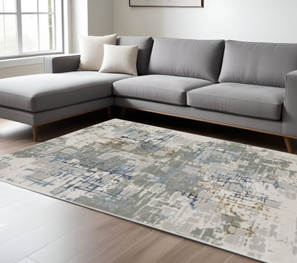 6' X 9' Grey Blue Brown Ivory And Deep Blue Abstract Power Loom Stain Resistant Area Rug