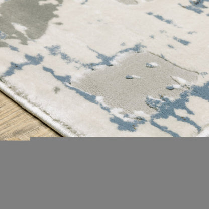 6' X 9' Grey Blue Brown Ivory And Deep Blue Abstract Power Loom Stain Resistant Area Rug