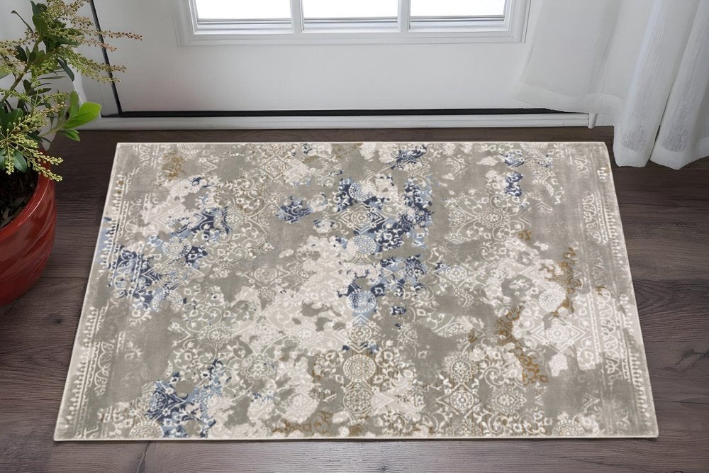 3' X 5' Grey Blue Ivory Brown And Navy Abstract Power Loom Stain Resistant Area Rug