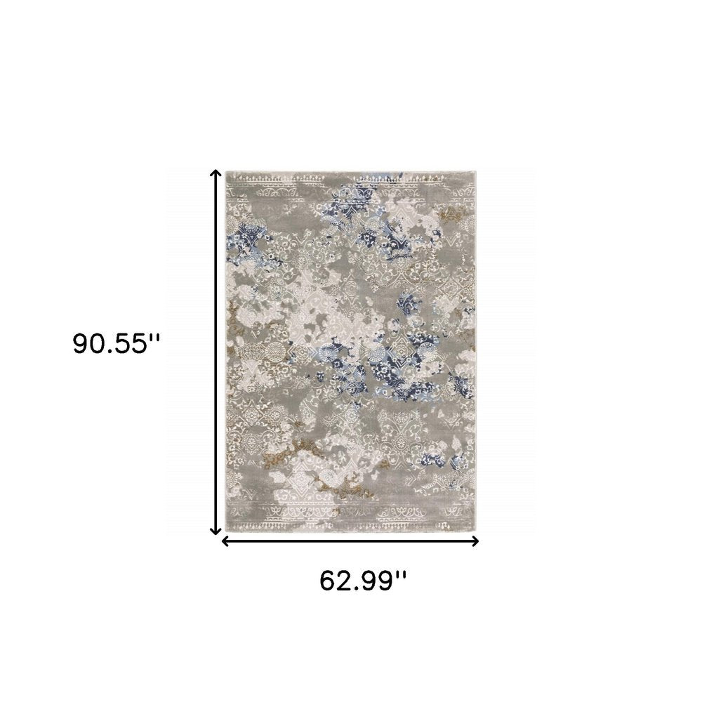 5' X 8' Grey Blue Ivory Brown And Navy Abstract Power Loom Stain Resistant Area Rug