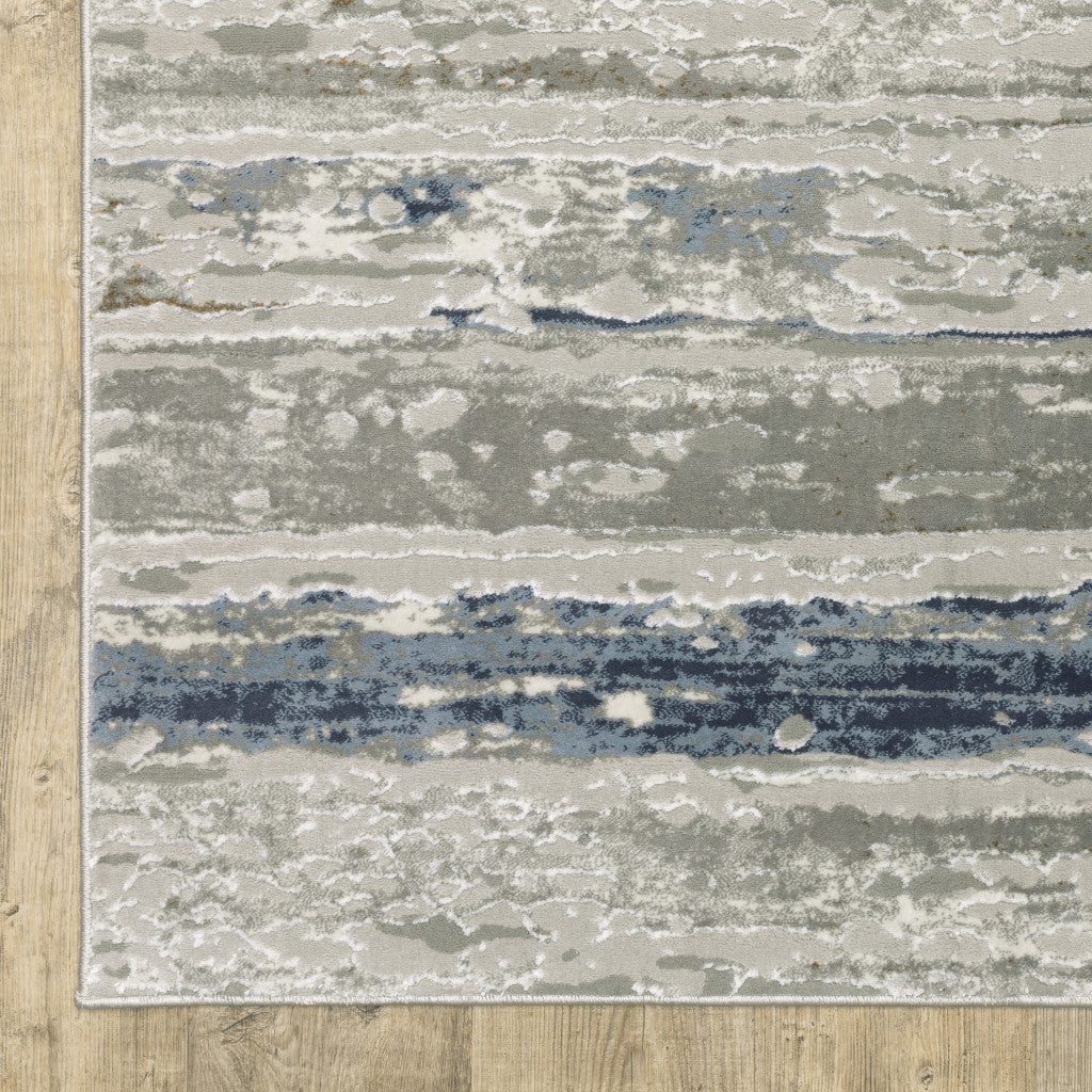 5' X 8' Blue Ivory Grey Light Blue And Brown Abstract Power Loom Stain Resistant Area Rug