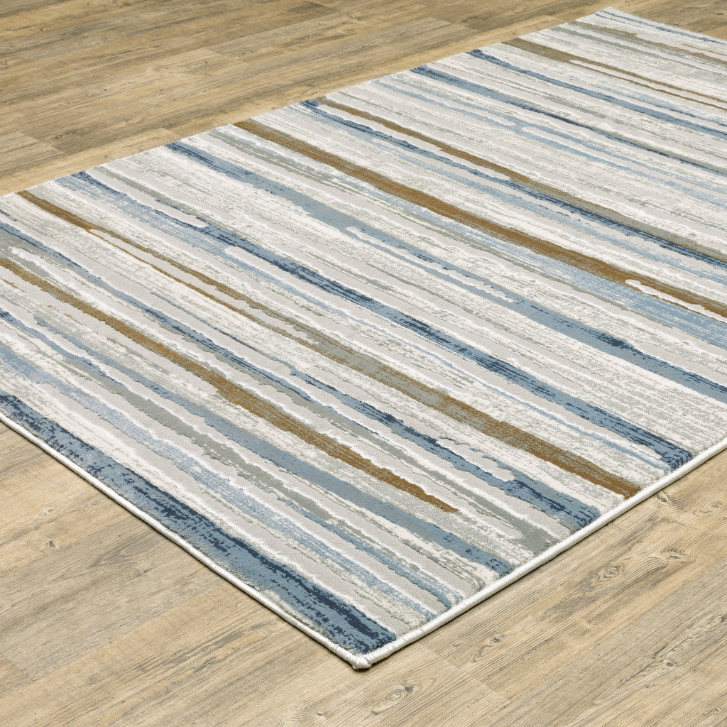 5' X 8' Grey Blue Ivory Brown Beige And Navy Abstract Power Loom Stain Resistant Area Rug