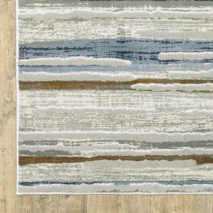 5' X 8' Grey Blue Ivory Brown Beige And Navy Abstract Power Loom Stain Resistant Area Rug