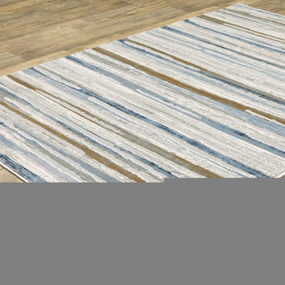 6' X 9' Grey Blue Ivory Brown Beige And Navy Abstract Power Loom Stain Resistant Area Rug