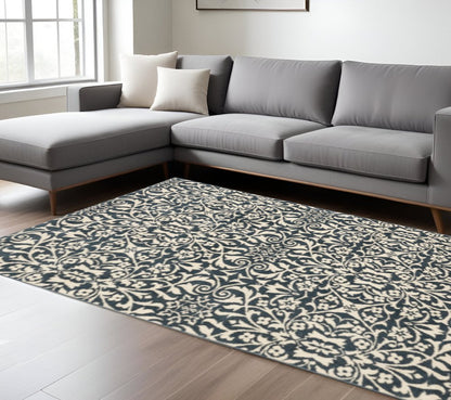 10' X 13' Blue And Ivory Floral Power Loom Stain Resistant Area Rug