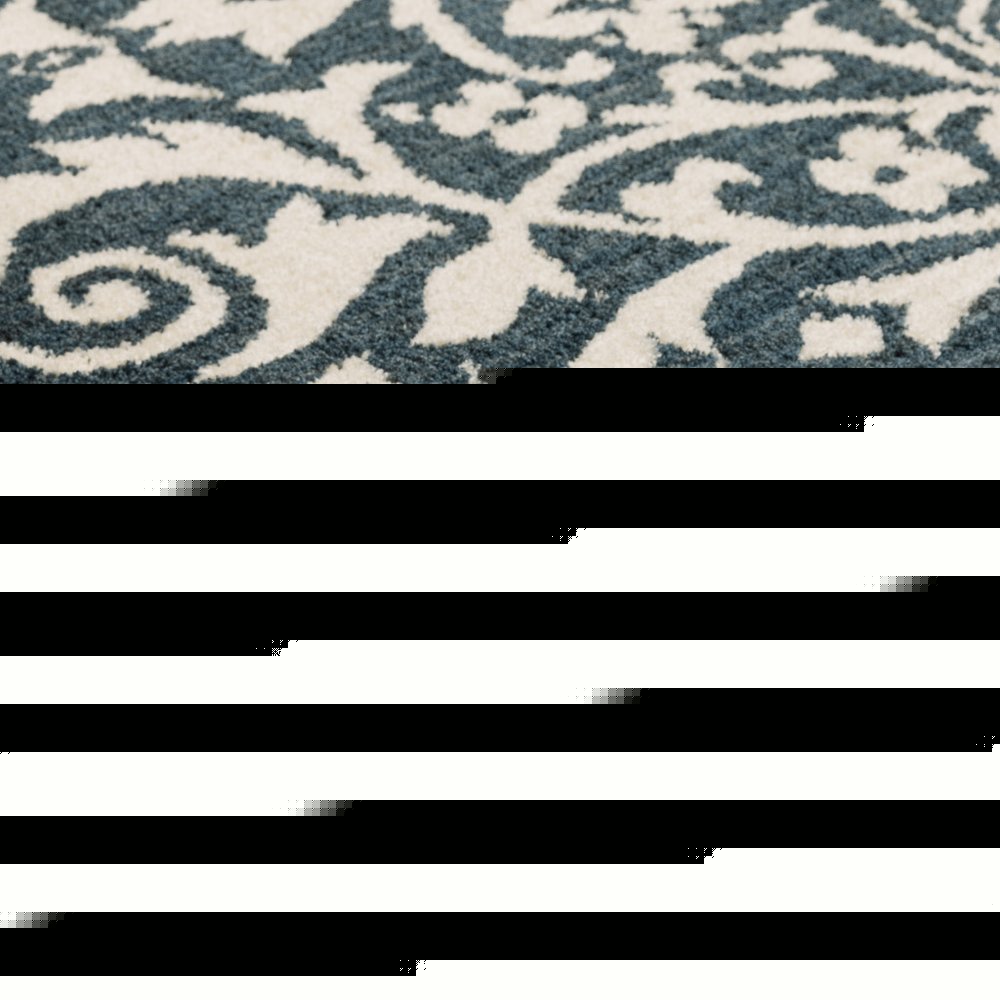10' X 13' Blue And Ivory Floral Power Loom Stain Resistant Area Rug