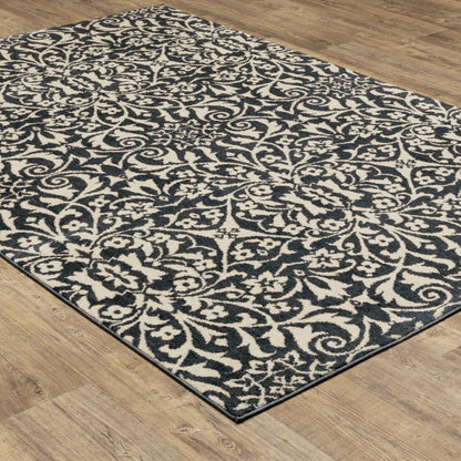 10' X 13' Blue And Ivory Floral Power Loom Stain Resistant Area Rug