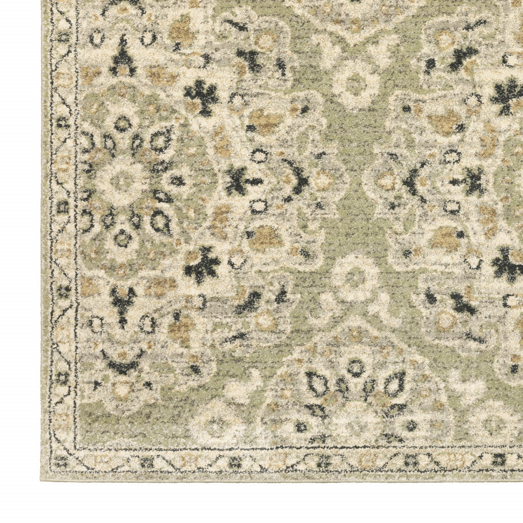 5' X 8' Green Ivory Grey And Tan Floral Power Loom Stain Resistant Area Rug