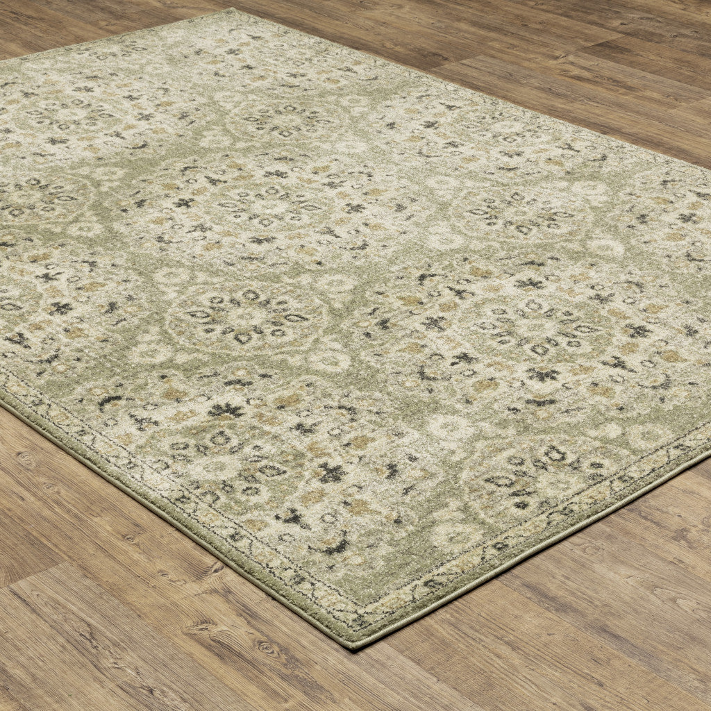 8' X 11' Green Ivory Grey And Tan Floral Power Loom Stain Resistant Area Rug