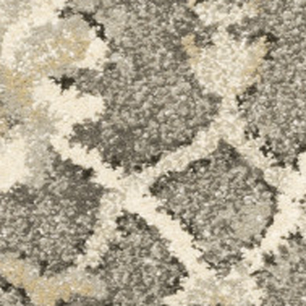 5' X 8' Grey Beige Tan And Brown Oriental Power Loom Stain Resistant Area Rug