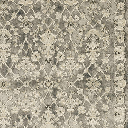 6' X 9' Grey Beige Tan And Brown Oriental Power Loom Stain Resistant Area Rug