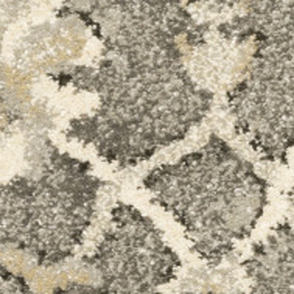 6' X 9' Grey Beige Tan And Brown Oriental Power Loom Stain Resistant Area Rug