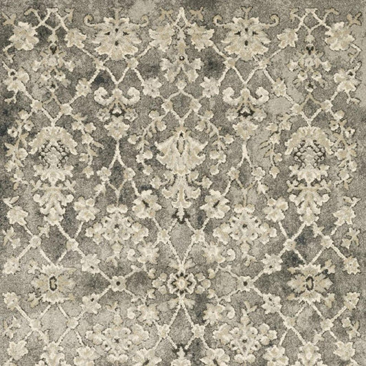 6' X 9' Grey Beige Tan And Brown Oriental Power Loom Stain Resistant Area Rug