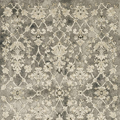 6' X 9' Grey Beige Tan And Brown Oriental Power Loom Stain Resistant Area Rug