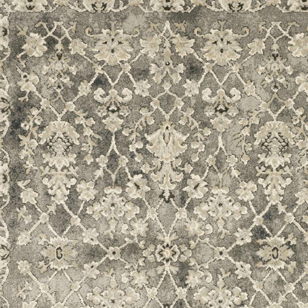 8' X 11' Grey Beige Tan And Brown Oriental Power Loom Stain Resistant Area Rug
