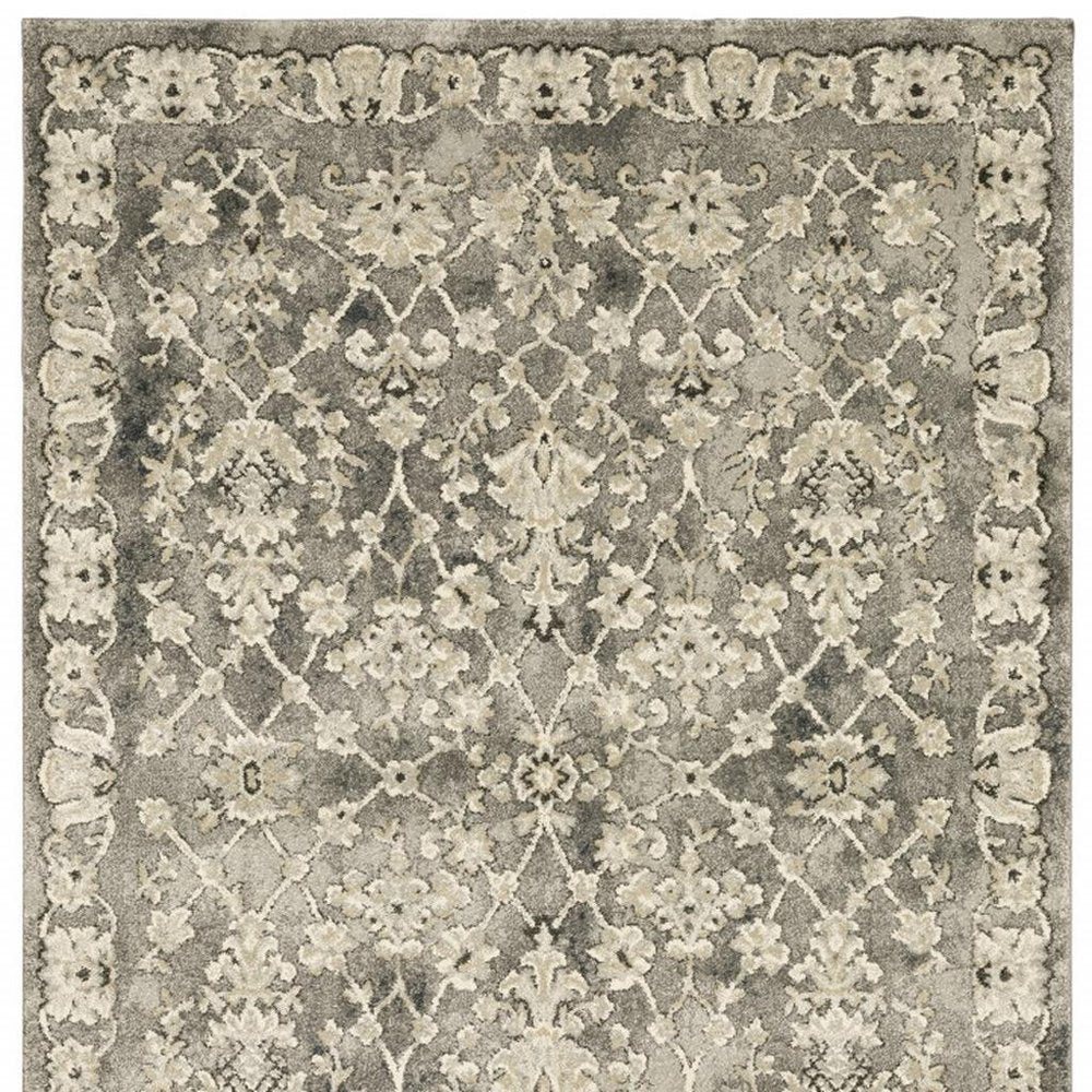 8' X 11' Grey Beige Tan And Brown Oriental Power Loom Stain Resistant Area Rug