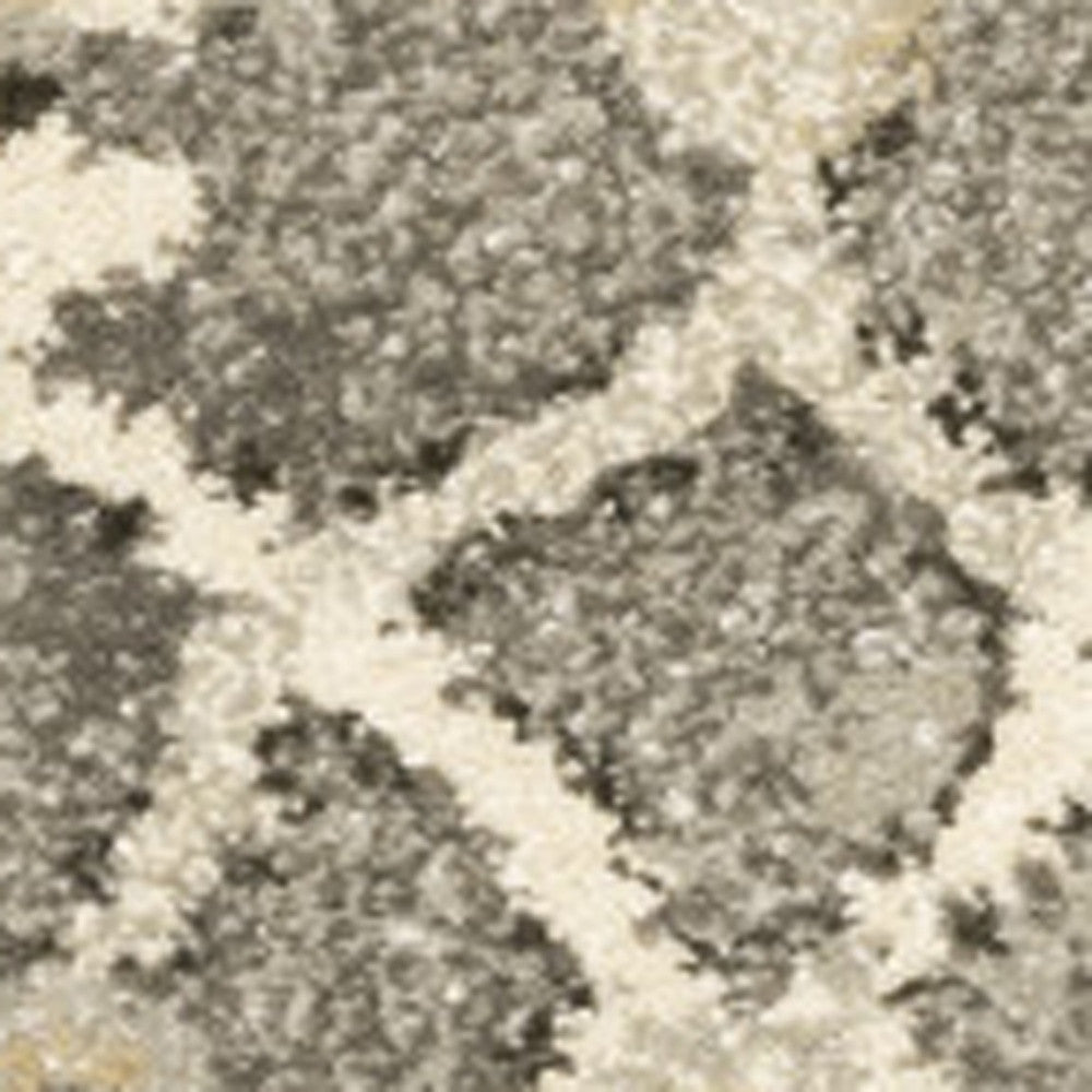 8' X 11' Grey Beige Tan And Brown Oriental Power Loom Stain Resistant Area Rug