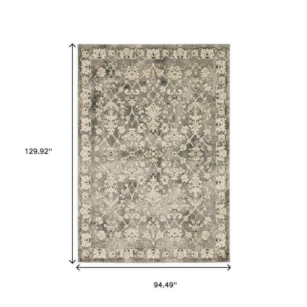 8' X 11' Grey Beige Tan And Brown Oriental Power Loom Stain Resistant Area Rug