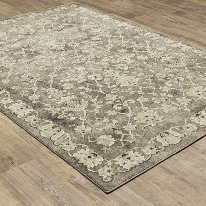8' X 11' Grey Beige Tan And Brown Oriental Power Loom Stain Resistant Area Rug