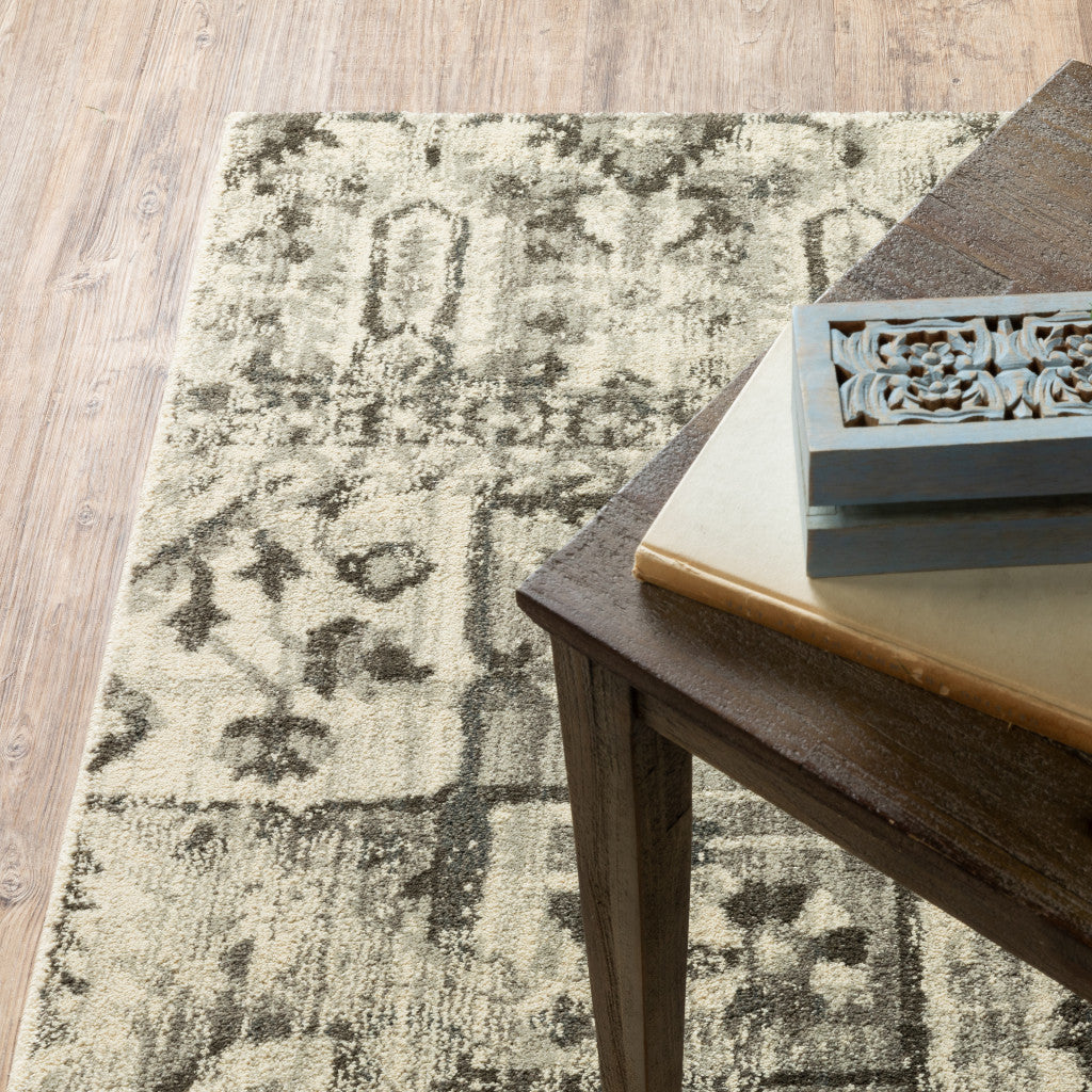 5' X 8' Grey Ivory And Brown Oriental Power Loom Stain Resistant Area Rug